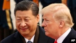 Tổng thống Trump trong cuộc gặp với Chủ tịch Tập Cận Bình ở Bắc Kinh năm 2017.