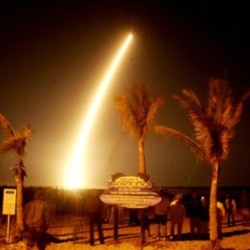 Spectators in Cocoa Beach, Florida, watch the March 2009 launch of NASA's planet-hunting spacecraft Kepler