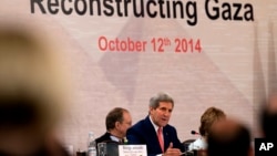 ລັດຖະມົນຕີ ການຕ່າງປະເທດ ສະຫະລັດ ທ່ານ John Kerry ກ່າວປາໄສໃນລະຫວ່າງກອງປະຊຸມ ທີ່ໄຄໂຣ ອີຈິບ, ວັນທີ 12 ຕຸລາ 2014. 