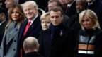 Phản ứng của ông Trump và các nhà lãnh đạo Đức và Pháp khi thấy ông Putin tại một sự kiện ở Pháp tháng 11 năm ngoái. 