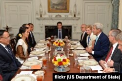 U.S. Secretary of State John Kerry participates in a luncheon with Myanmar's State Counselor Aung San Suu Kyi at the Blair House in Washington, D.C., Sept. 14, 2016.