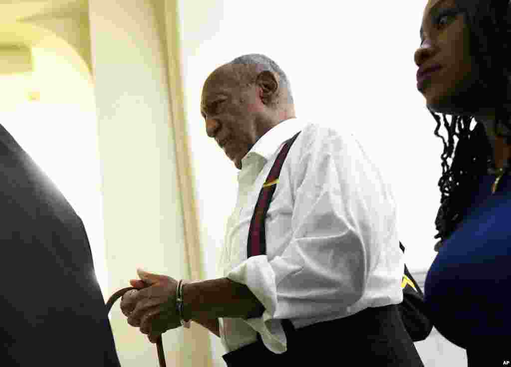 American Comedian and former TV star Bill Cosby is taken away in handcuffs after he was sentenced to three-to 10-years for 2004 sexual assault in Norristown, Pennsylvania. His Hollywood career and good-guy image in ruins, an 81-year-old Bill Cosby was put behind bars for drugging and sexually assaulting a woman, becoming the first celebrity of the #MeToo era to be sent to prison.
