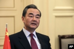 Chinese Foreign Minister Wang Yi speaks during a meeting in Athens, on April 23, 2017.