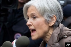 Jill Stein, the presidential Green Party candidate, speaks in front of Trump Tower, Monday, Dec. 5, 2016, in New York. Stein had pushed for recounts in the election vote in Wisconsin, Pennsylvania and Michigan.