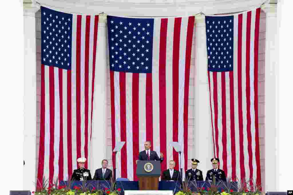 President Barack Obama speaks at the Memorial Amphitheater of Arlington National Cemetery during a Memorial Day ceremony, in Arlington, Virginia.