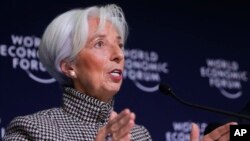 International Monetary Fund Managing Director Christine Lagarde briefs the media during a news conference at the annual meeting of the World Economic Forum, WEF, in Davos, Jan. 21, 2019. 
