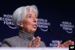 FILE - International Monetary Fund Managing Director Christine Lagarde briefs the media during a news conference at the annual meeting of the World Economic Forum, WEF, in Davos, Jan. 21, 2019.
