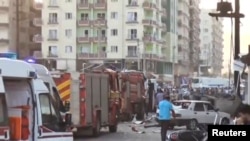 A still image taken from a video footage shows emergency vehicles at the scene of a bomb blast in Kiziltepe, Turkey, Aug. 10, 2016.