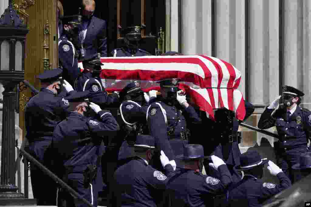 The casket carrying the body of fallen Boulder Police Department officer Eric Talley is carried by a Denver Police honor guard to a waiting hearse after a service at the Cathedral Basilica of the Immaculate Conception, March 29, 2021, in Denver, Colorado.&nbsp;Talley and nine other people were killed during a mass shooting at a grocery store in Boulder on March 22.