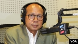 Mr. Ok Serei Sopheak, a governance specialist discusses the potential impact of a pending NGO law on civil society organizations in Cambodia, during VOA Khmer's monthly Hello VOA radio call-in show in Phnom Penh, Monday, April 27, 2015. (Lim Sothy/VOA Khm