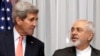美國國務卿克里(左）和伊朗外長扎里夫（右）。（資料圖片）