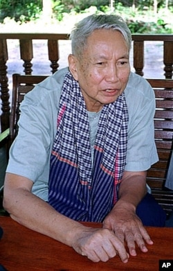 Former Khmer Rouge leader Pol Pot answers questions during an interview near Anlong Veng, Cambodia (1998 file photo)