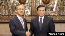 南韓與中國周二（6月20日）在北京恢復了中斷1年4個月的外交副部長級戰略對話。中國副外長張業遂(右)與南韓第一副外長林聖男。
