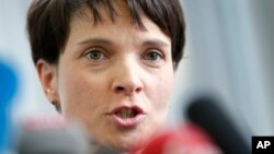 Frauke Petry, Chairwoman of the AfD, Alternative fuer Deutschland (Alternative for Germany), party addresses the media during a press conference in Berlin, Feb. 22, 2016. 