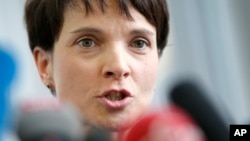 Frauke Petry, Chairwoman of the AfD, Alternative fuer Deutschland (Alternative for Germany), party addresses the media during a press conference in Berlin, Feb. 22, 2016. 