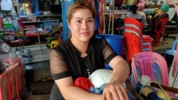 Sok Bopha, a hairdresser at Canadia Industrial Park Market, is seeing only a fraction of clients she once did before the coronavirus pandemic, Veng Sreng Boulevard, Phnom Penh, Cambodia, Thursday, March 5th, 2020. (Nem Sopheakpanha/VOA Khmer)