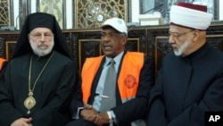 Arab League monitors meet with religious leaders in Damascus Jan. 17, 2012