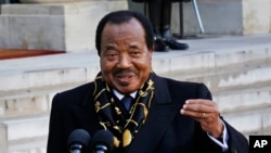 FILE - Cameroon's President Paul Biya addresses reporters following his meeting with French President Francois Hollande at the Elyse Palace in Paris, Jan 30, 2013. 