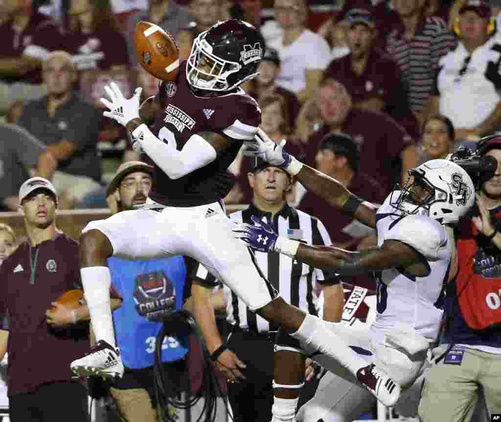 Mississippi State cornerback Cameron Dantzler (3) intercepts a pass intended for Stephen F. Austin wide receiver Tamrick Pace (80) in the second half of an NCAA college football game, Sept. 1, 2018, in Starkville, Mississippi.