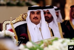 FILE - In this Dec. 9, 2014, file photo, Qatar's Emir Sheik Tamim attends a Gulf Cooperation Council summit in Doha, Qatar.