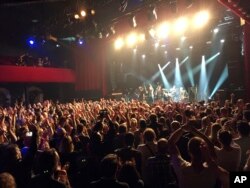 British musician Sting performs on stage at the Bataclan concert hall in Paris, France, Nov. 12, 2016. The show marked the reopening of the hall one year after suicidal jihadis turned it into a bloodbath and killed 90 revelers.