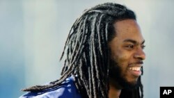 Seattle Seahawks cornerback Richard Sherman leaving football practice on January 24, 2014 near Seattle, Washington.