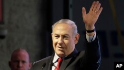 Israeli Prime Minister Benjamin Netanyahu waves during the opening ceremony for a bomb-proof emergency room in a hospital in Ashkelon, Israel, Feb. 20, 2018.