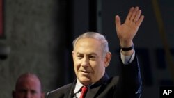 FILE - Israeli Prime Minister Benjamin Netanyahu waves during the opening ceremony for a bomb-proof emergency room in a hospital in Ashkelon, Israel, Feb. 20, 2018.