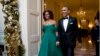 Penghasilan Pasangan Obama Turun Pada 2013