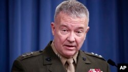FILE - In this April1 14, 2018, file photo, then-Marine Lt. Gen. Kenneth "Frank" McKenzie speaks during a media availability at the Pentagon in Washington. 