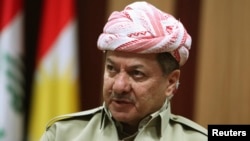 FILE - Kurdistan Regional Government President Masoud Barzani speaks during an interview in Arbil, in Iraq's Kurdistan region, May 12, 2014. 
