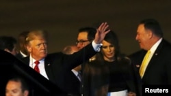 U.S. President Donald Trump and first lady Melania Trump arrive ahead of the G-20 leaders summit in Buenos Aires, Argentina, Nov. 29, 2018.