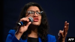 FILE - Congresswoman Rashida Tlaib of Michigan speaks to supporters of Democratic presidential candidate Senator Bernie Sanders at a campaign event in Clive, Iowa, on Jan. 31, 2020.