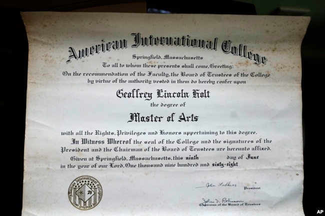 Geoffrey Holt's diploma for earning a Master's degree from American International College is seen Wednesday, Nov. 15, 2023, in Hinsdale, N.H. (AP Photo/Robert F. Bukaty)