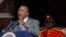 FILE - Kenya President Uhuru Kenyatta delivers a speech during Mashujaa Day -- also known as Heroes Day -- at the Nyayo Nationa Stadium, in Nairobi, Kenya, Oct. 20, 2014. 