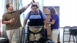 Robotic Suit Helps Paralyzed Man Walk