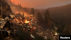 智利港口城市瓦爾帕萊索大火已經導致至少12人喪生，至少2千所房屋被燒毀。(3.13.2014)