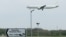 FILE - A plane comes in to land at Stansted Airport, in Stansted, near London Britain, April 16, 2020. 