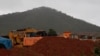 FILE - Mining equipment and piles of ore are seen at the Sino Africa Huijin mine in Penhalonga, Manicaland province, Zimbabwe, Sept. 17, 2024. (Enos Danher/VOA)