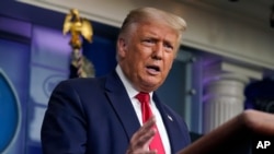 President Donald Trump speaks during a news conference at the White House, July 28, 2020, in Washington. 