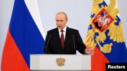 Tổng thống Nga Vladimir Putin phát biểu trong buổi lễ tuyên bố sáp nhập các vùng lãnh thổ do Nga kiểm soát tại 4 khu vực Donetsk, Luhansk, Kherson và Zaporizhzhia của Ukraine vào ngày 30/9/2022.