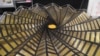 This image taken from video shows the center of the NASA project Starshade, which can unfurl and fold back up. (E. Lee/VOA)