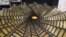 This image taken from video shows the center of the NASA project Starshade, which can unfurl and fold back up. (E. Lee/VOA)