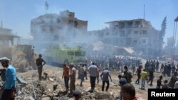 Lima orang tewas dan puluhan lainnya luka-luka ketika sebuah bom mobil meledak di kota Afrin, Suriah utara. (Foto: REUTERS/Rodi Said)
