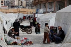 Internally displaced Syrians are seen in an IDP camp in Idlib, Syria, Feb. 27, 2020.