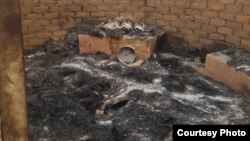 Indlu eyatshiswa ngenxa yodlakela lwezombusazwe.