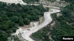 An Israeli military vehicle is seen near the Israeli-Lebanese border close to the northern Israeli city of Nahariya, Jan. 31, 2013.