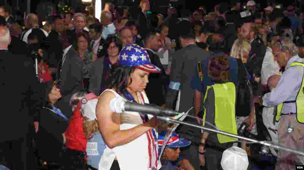 Delegates sport their hats at the DNC in Philadelphia (Photo: S. Barua/VOA)