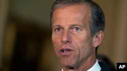 FILE - Sen. John Thune, R-S.D. addresses the media after a policy luncheon on Capitol Hill in Washington, July 21, 2015. 