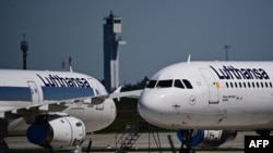 FILE - Parked aircraft operated by German airline Lufthansa sit at Berlin Brandenburg BER airport Willy-Brandt in Schoenefeld near Berlin on May 31, 2021. Lufthansa announced on April 11, 2024, that it would continue to suspend flights to and from Tehran until April 18.